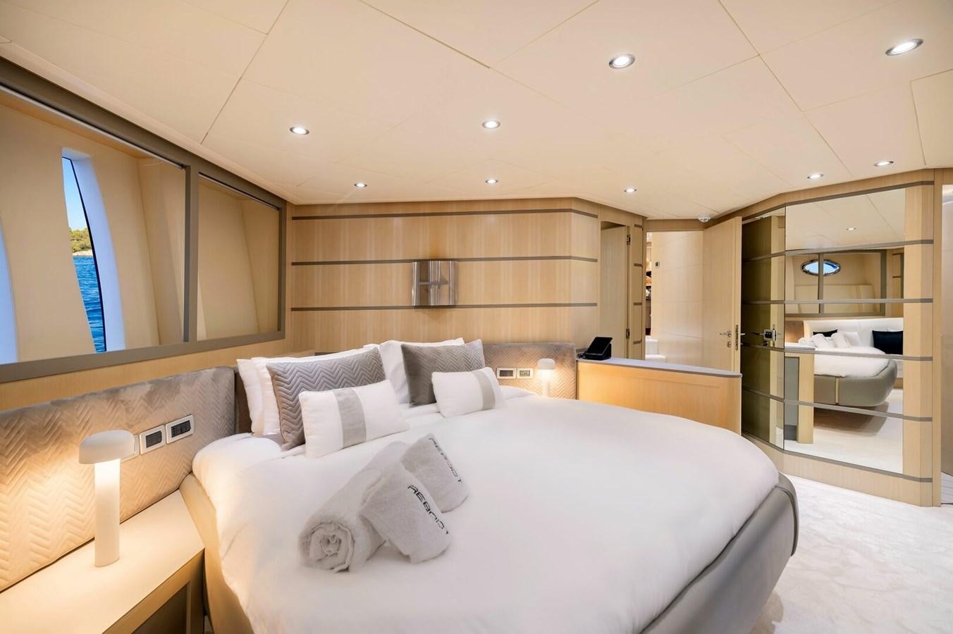 a large hotel room with a large bed aboard REBOOT Yacht for Sale