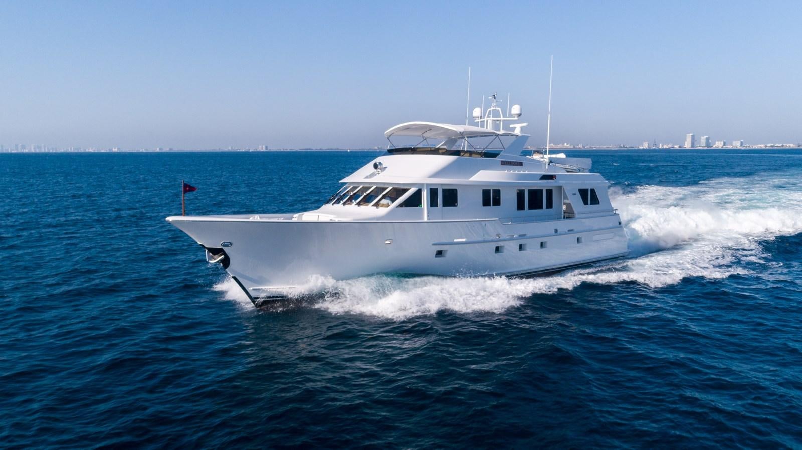 a white boat in the water aboard WELL DONE Yacht for Sale