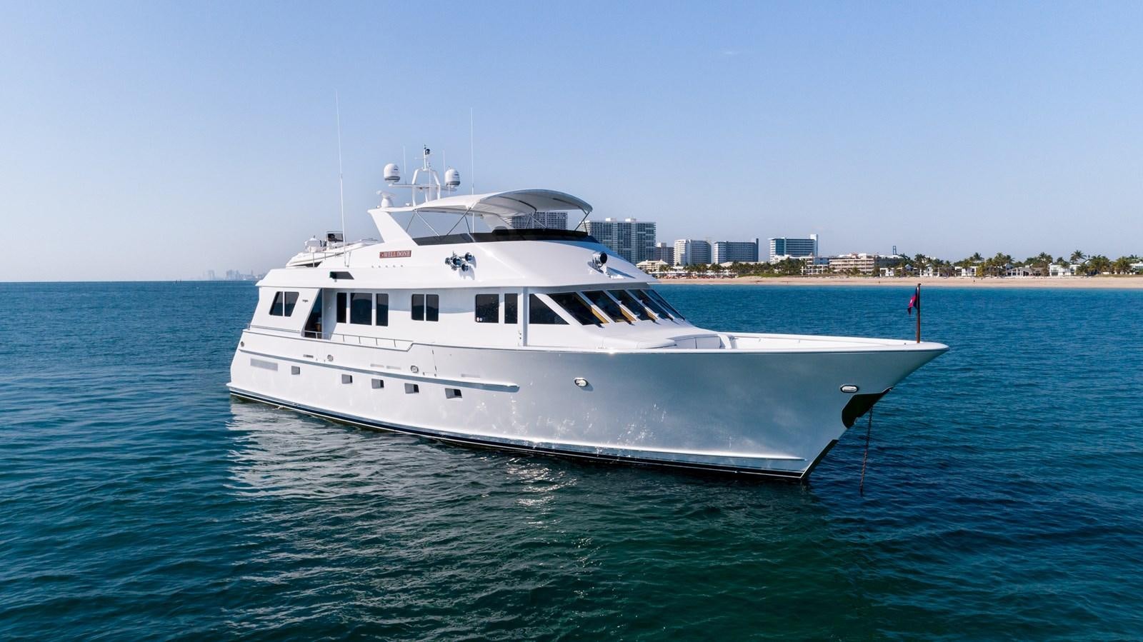 a white boat in the water aboard WELL DONE Yacht for Sale