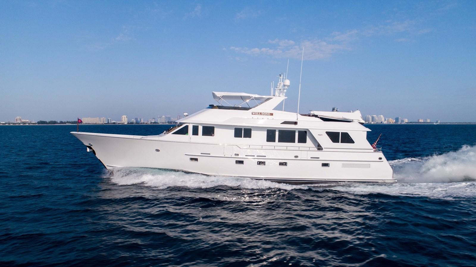 a white boat in the water aboard WELL DONE Yacht for Sale