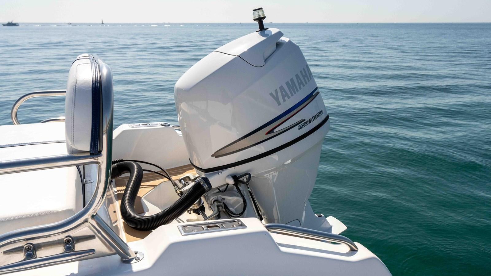 a boat on the water aboard WELL DONE Yacht for Sale