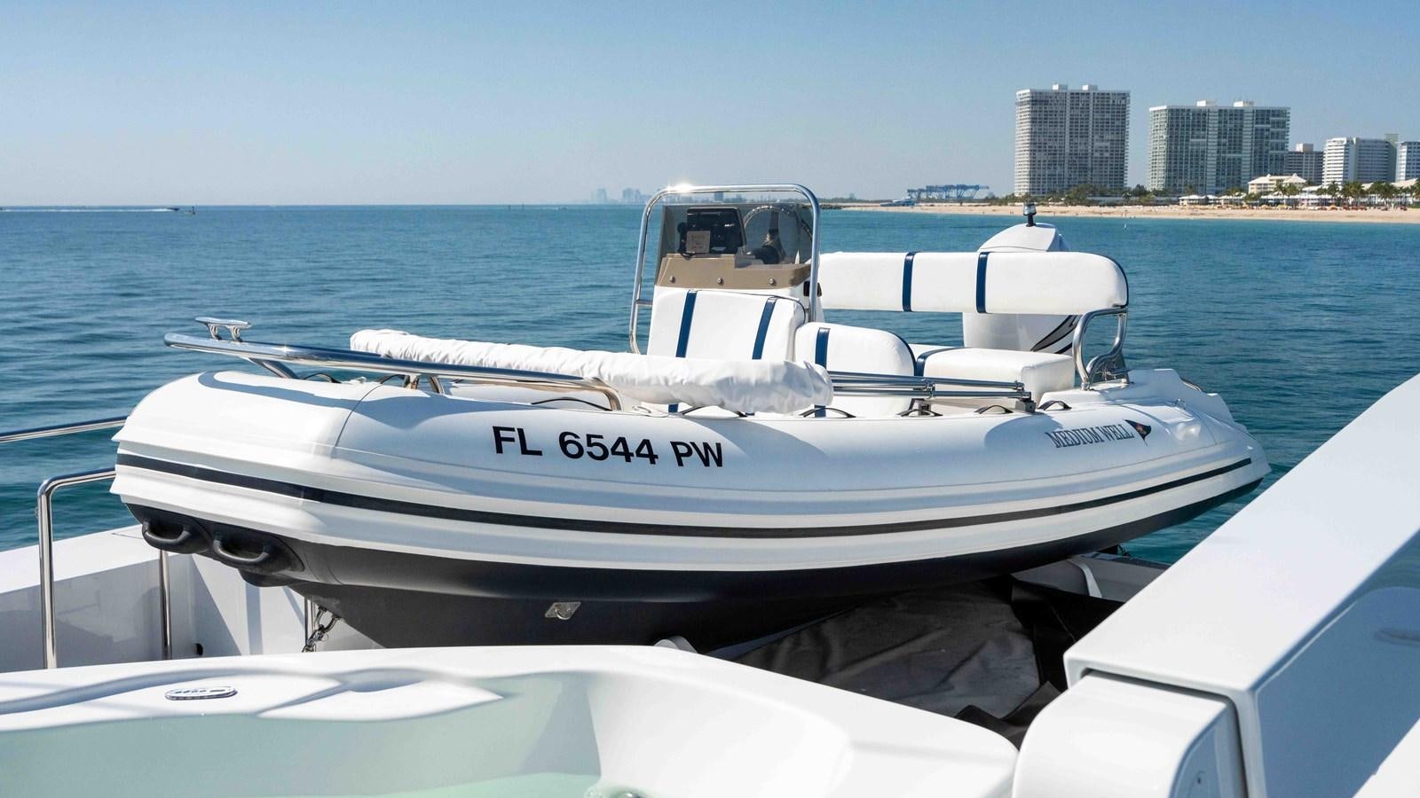 a boat on the water aboard WELL DONE Yacht for Sale