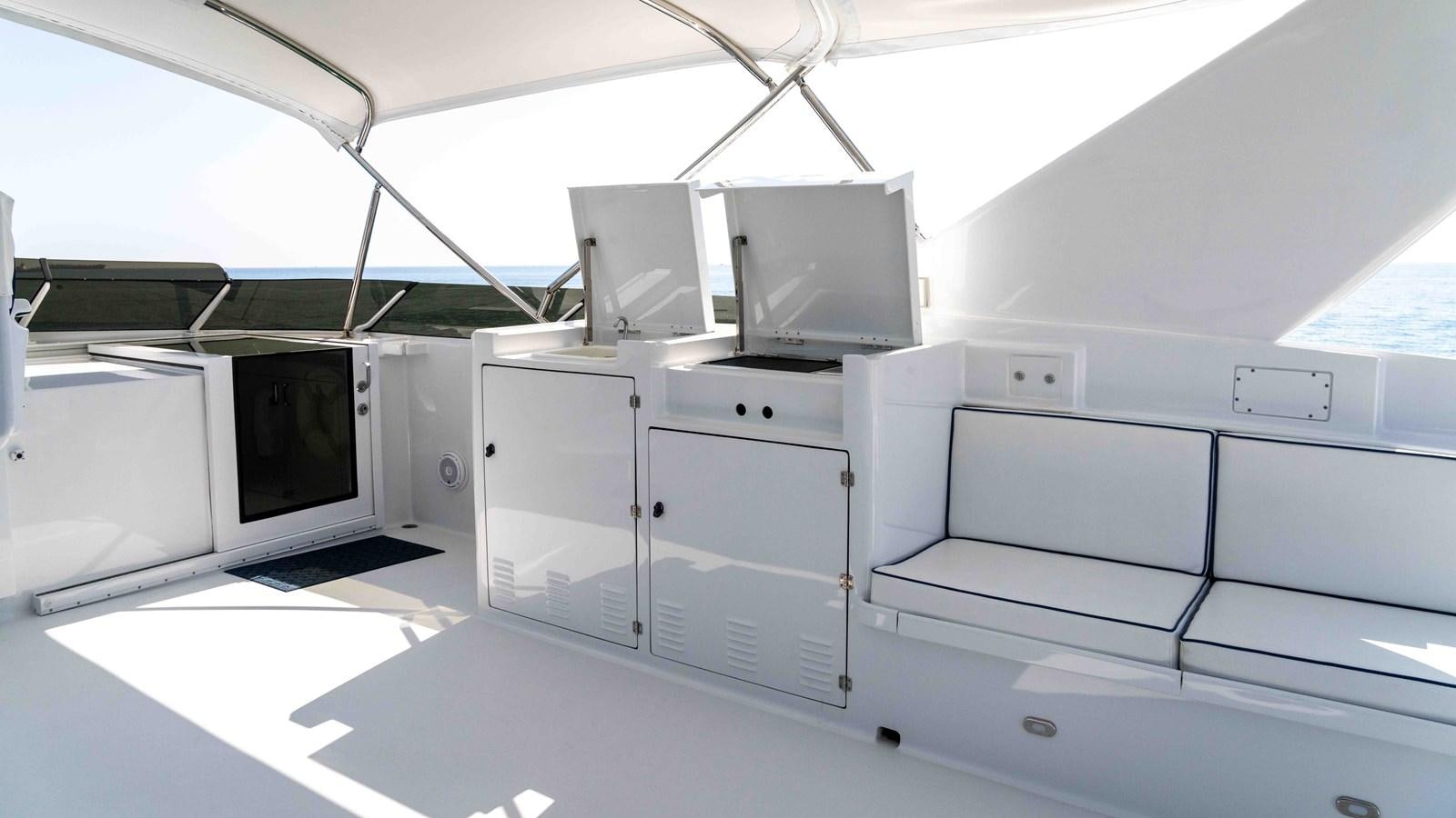 a room with computers aboard WELL DONE Yacht for Sale
