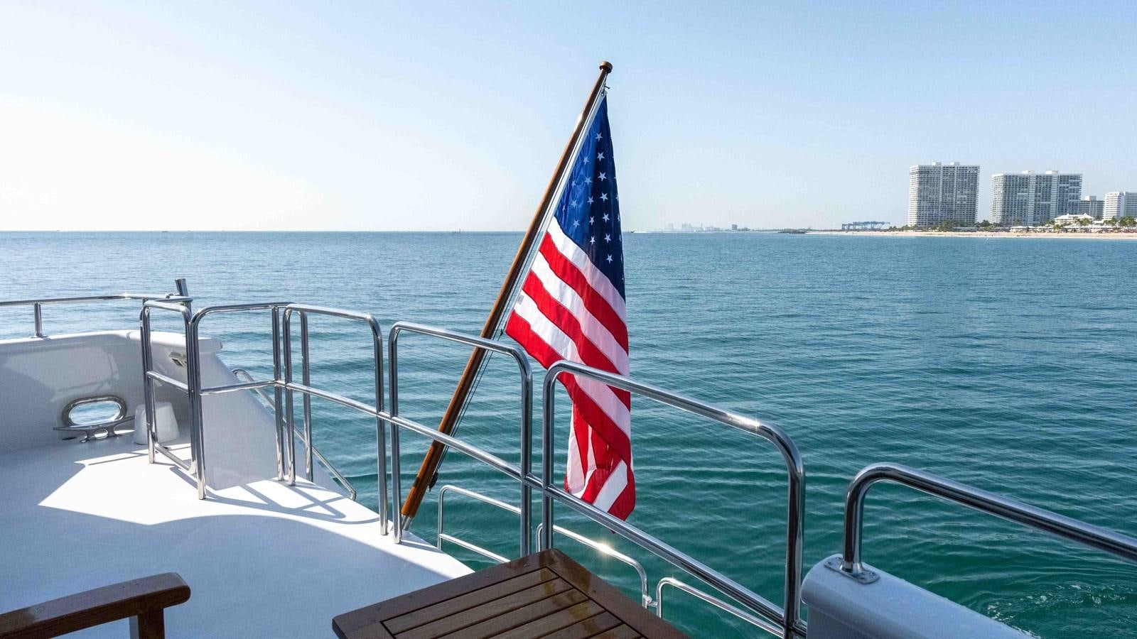 a flag on a boat aboard WELL DONE Yacht for Sale