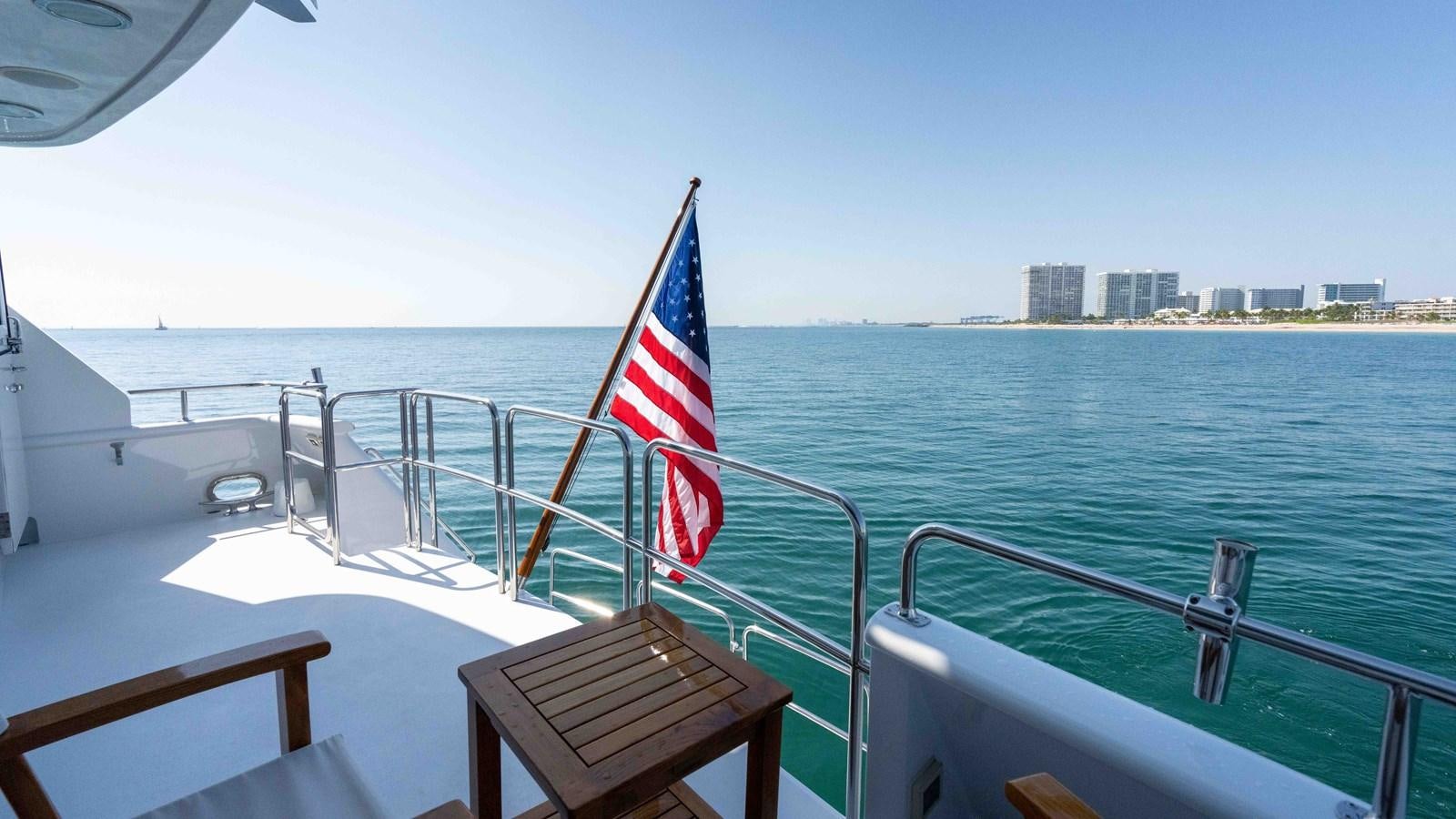a flag on a boat aboard WELL DONE Yacht for Sale