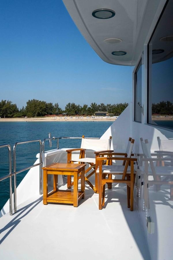 a boat on the water aboard WELL DONE Yacht for Sale