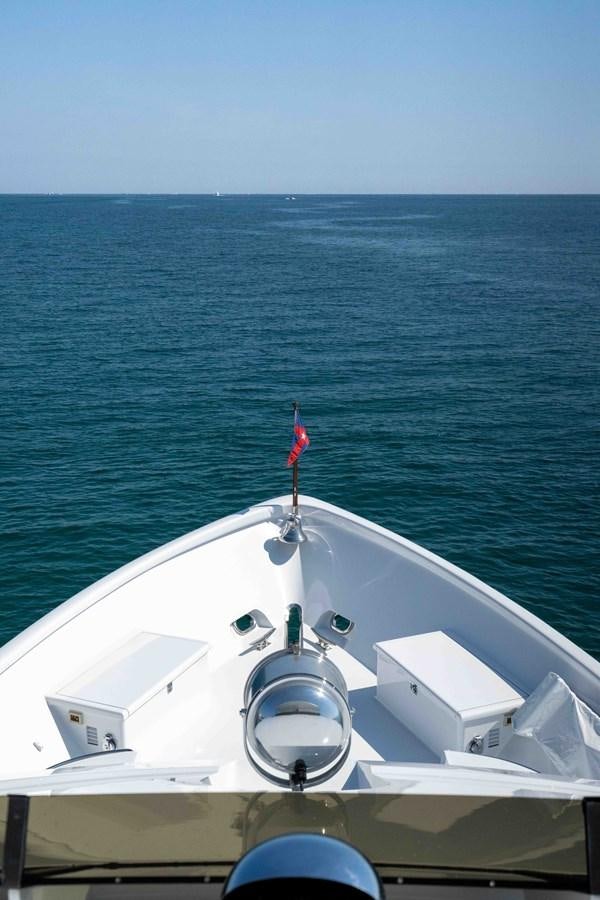a boat on the water aboard WELL DONE Yacht for Sale