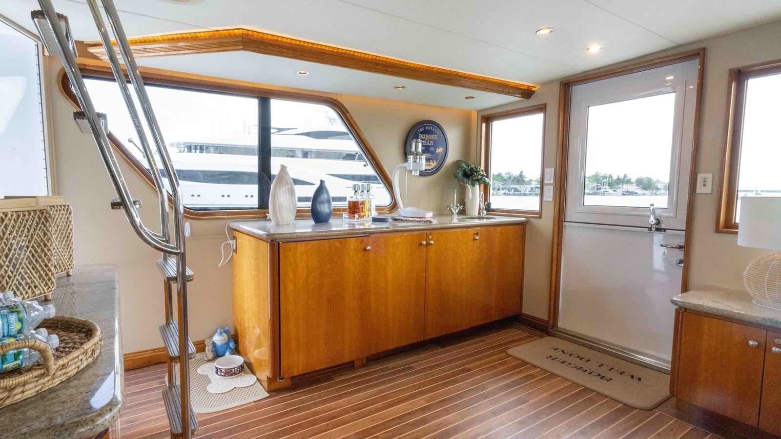 a kitchen with a large mirror aboard WELL DONE Yacht for Sale