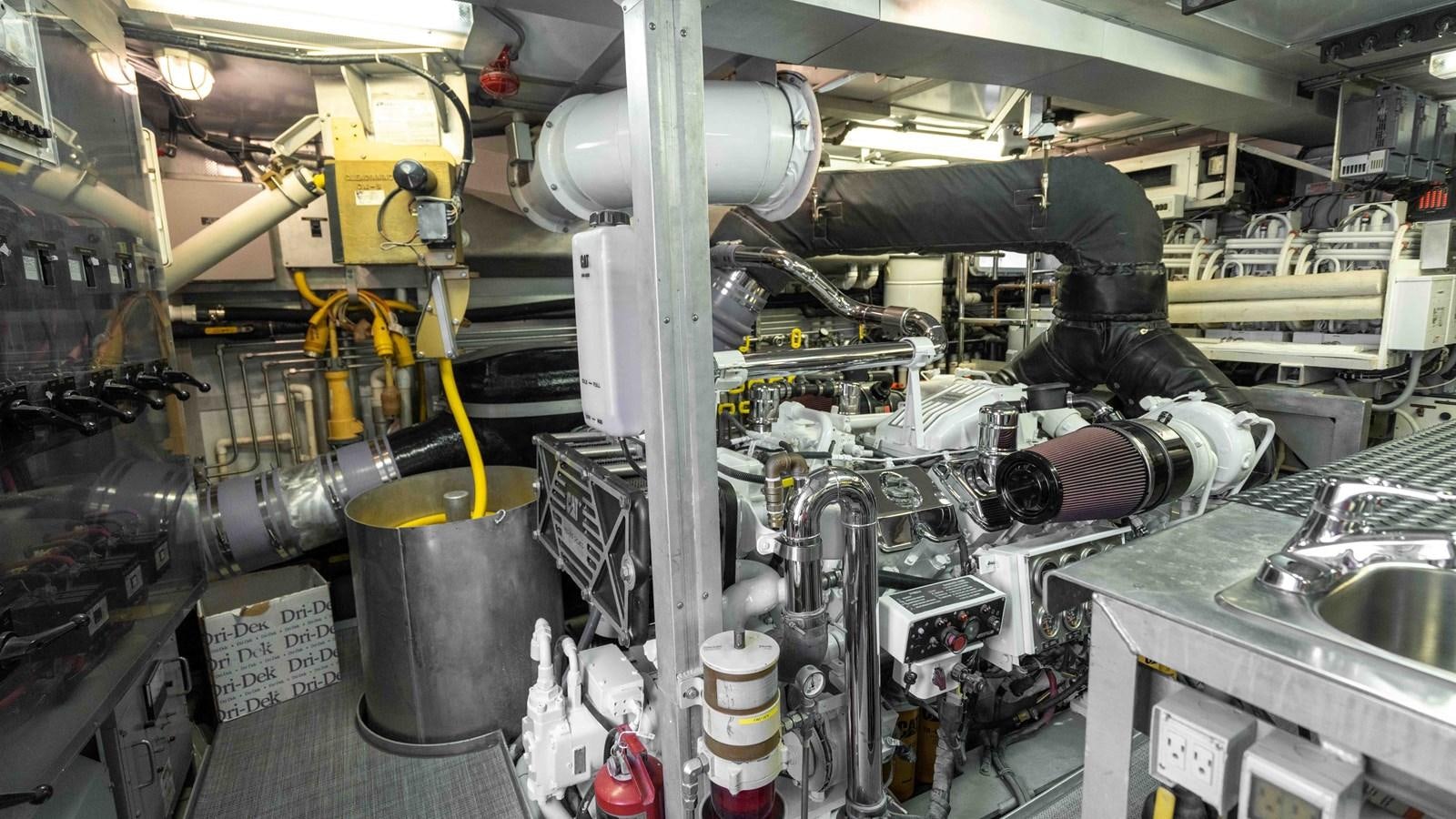 a factory with a large machine aboard WELL DONE Yacht for Sale