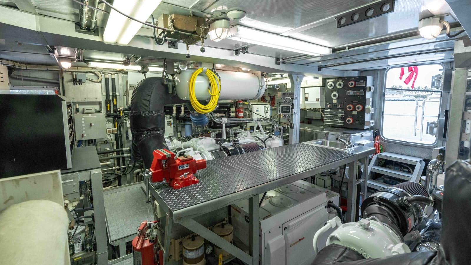a room with machinery and equipment aboard WELL DONE Yacht for Sale