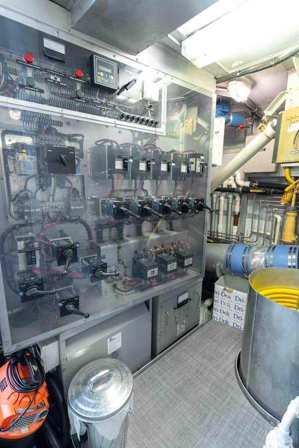a store with shelves of electronics aboard WELL DONE Yacht for Sale