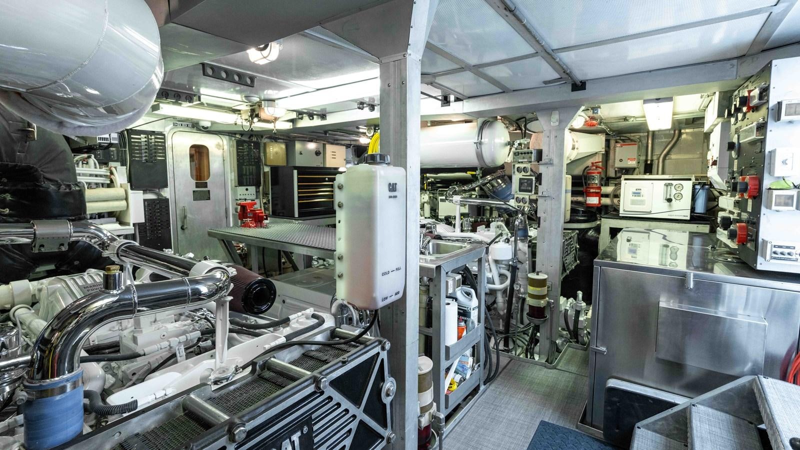 a room with machinery aboard WELL DONE Yacht for Sale