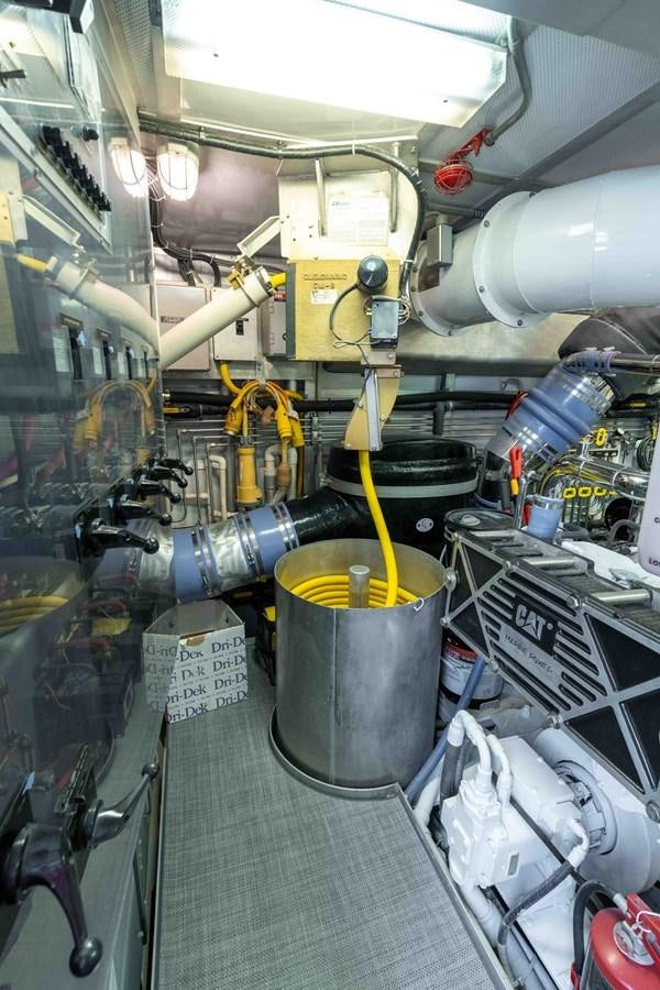 a room with machinery aboard WELL DONE Yacht for Sale