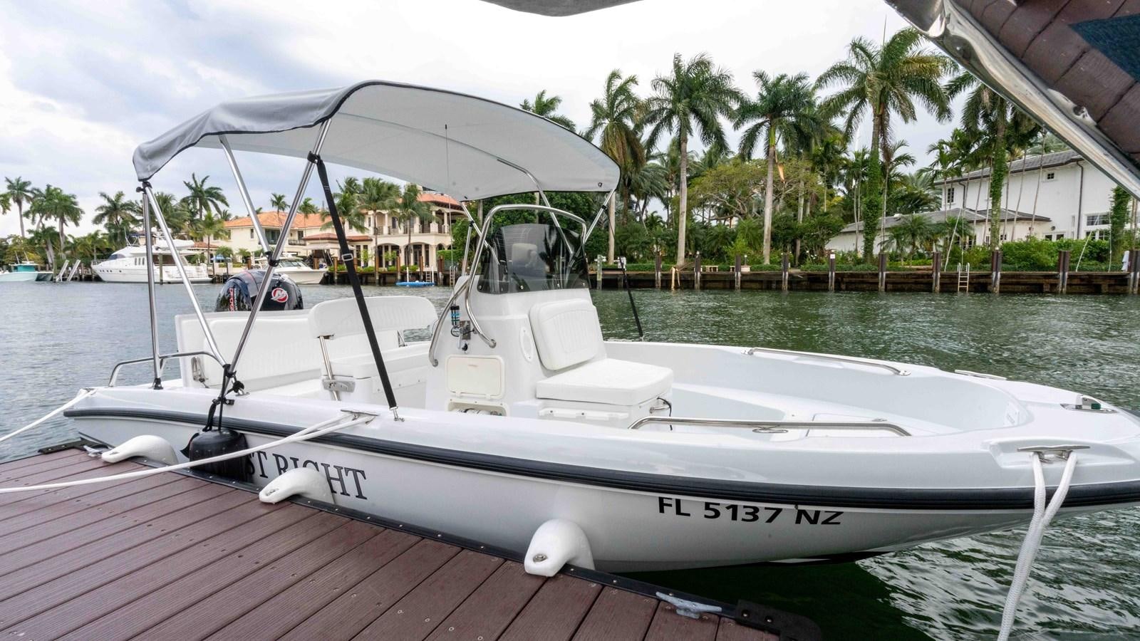 a boat on the water aboard WELL DONE Yacht for Sale