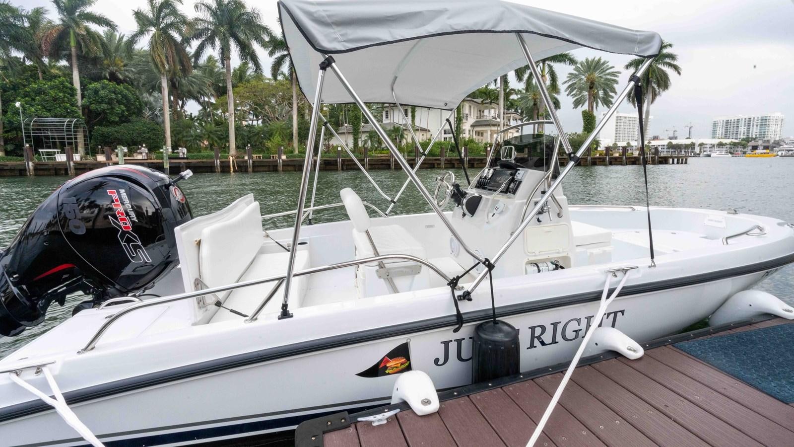 a boat on the water aboard WELL DONE Yacht for Sale