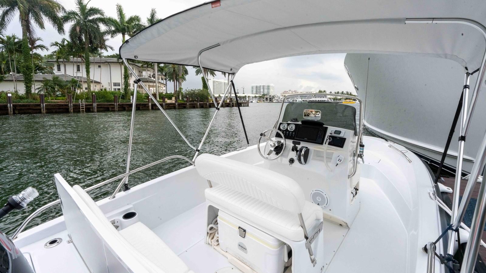 a boat on the water aboard WELL DONE Yacht for Sale