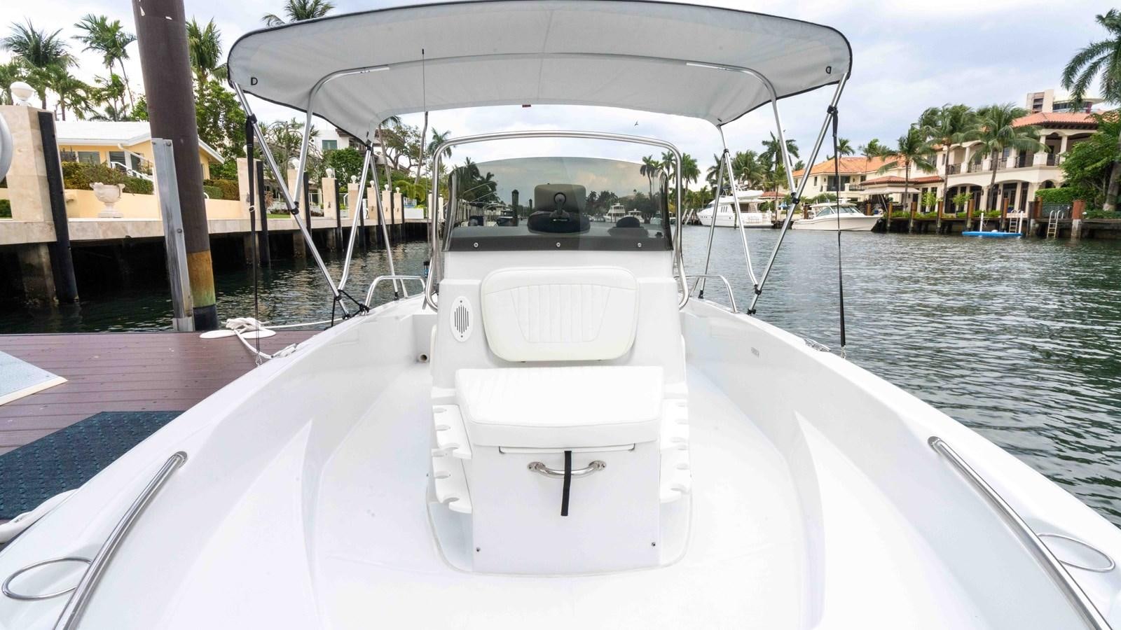 a boat on the water aboard WELL DONE Yacht for Sale