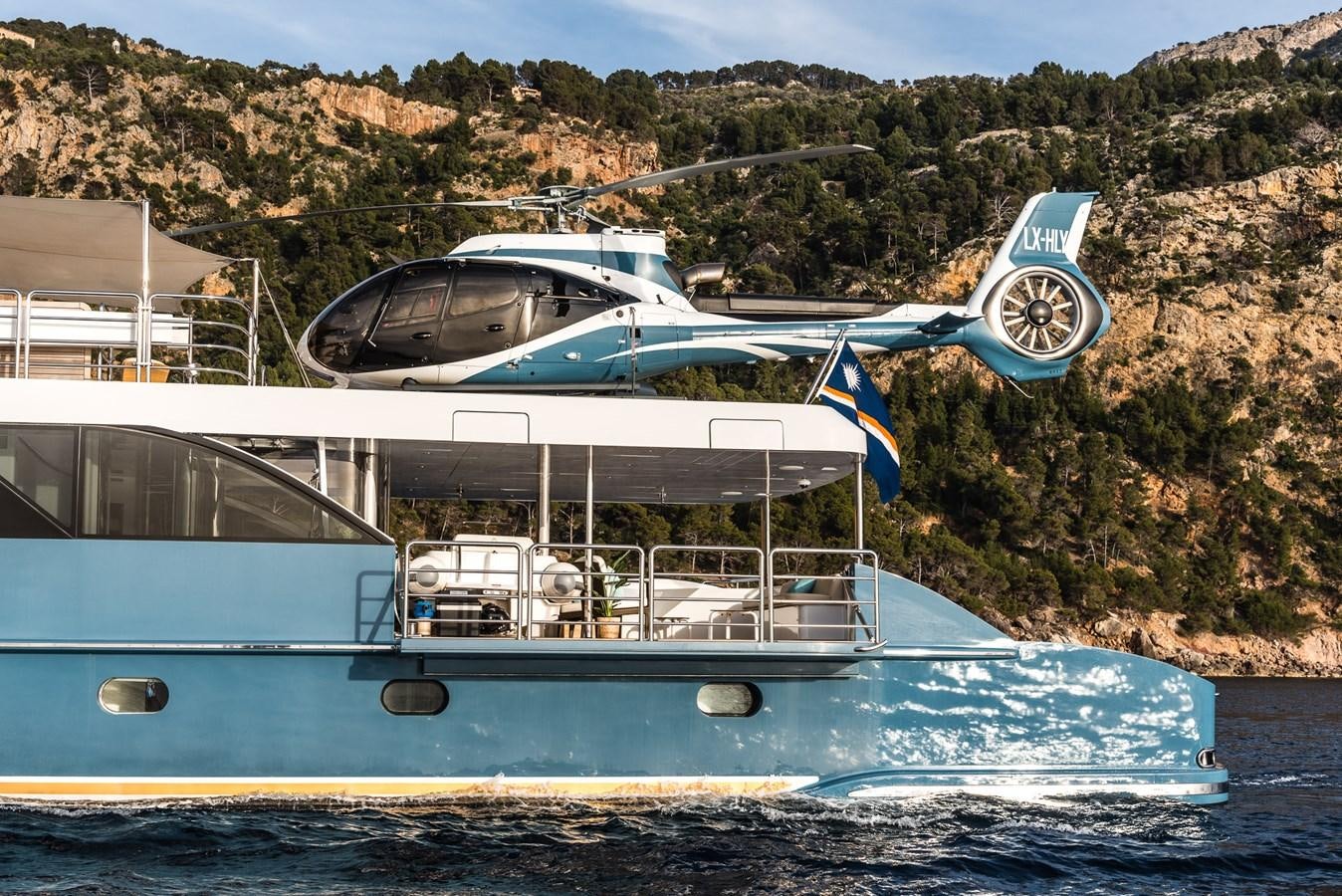 a boat with a plane on the back aboard FLYING MANTA Yacht for Sale
