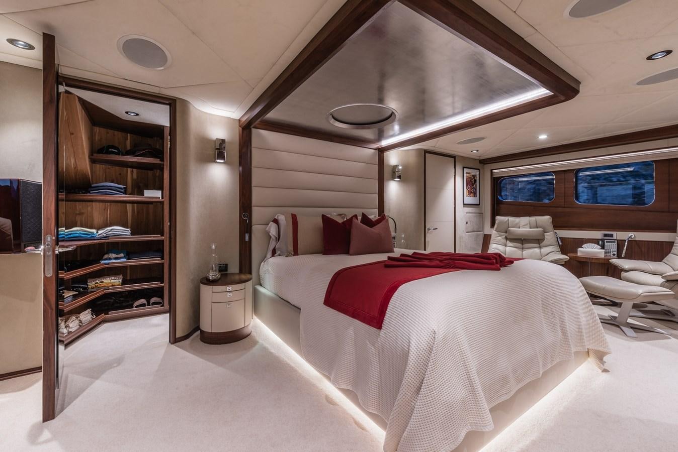 a room with a bed and a shelf aboard FLYING MANTA Yacht for Sale
