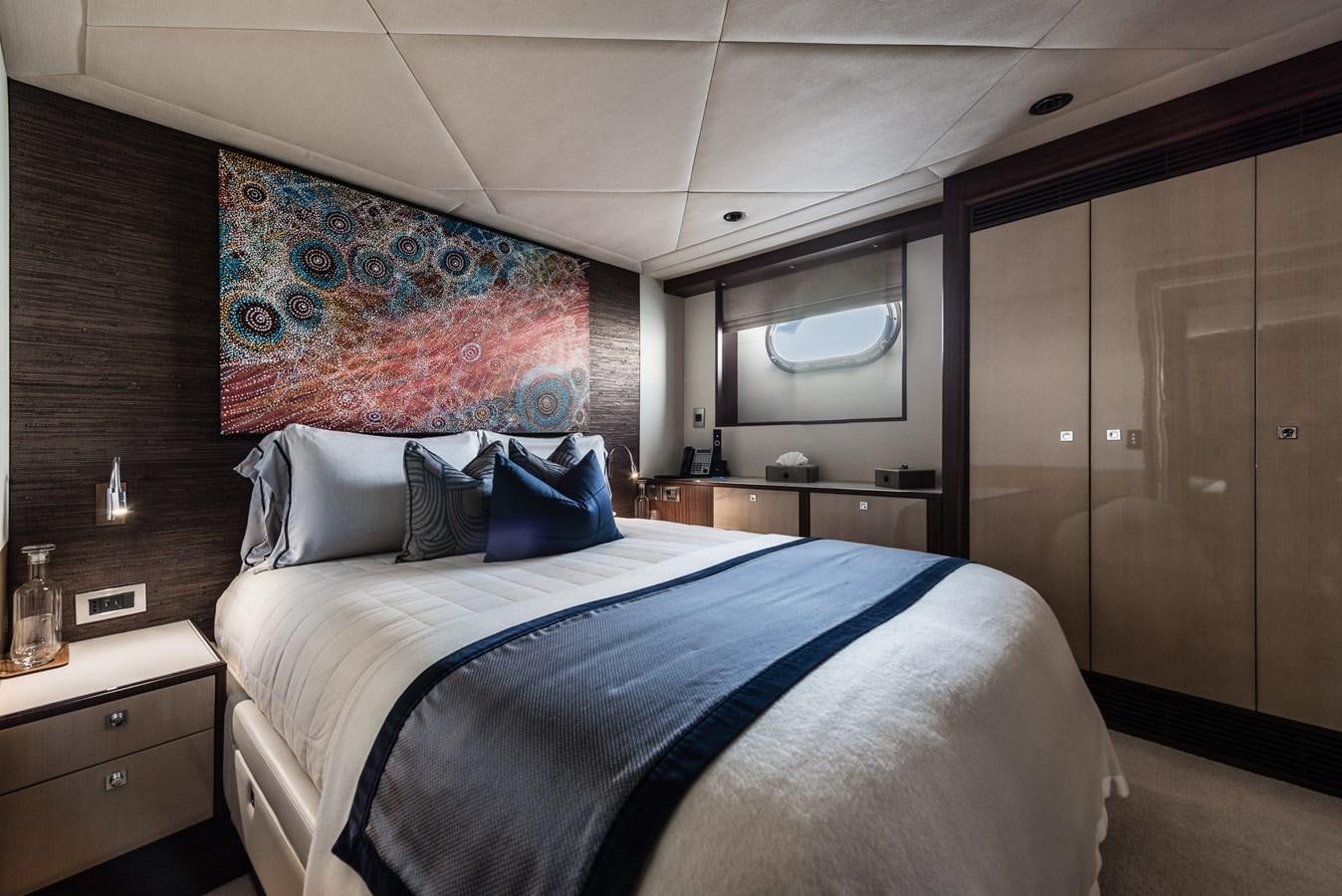 a bed in a room aboard FLYING MANTA Yacht for Sale
