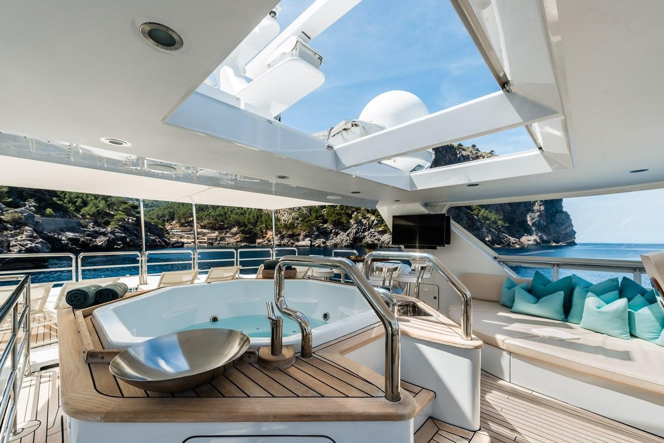 a large swimming pool aboard FLYING MANTA Yacht for Sale