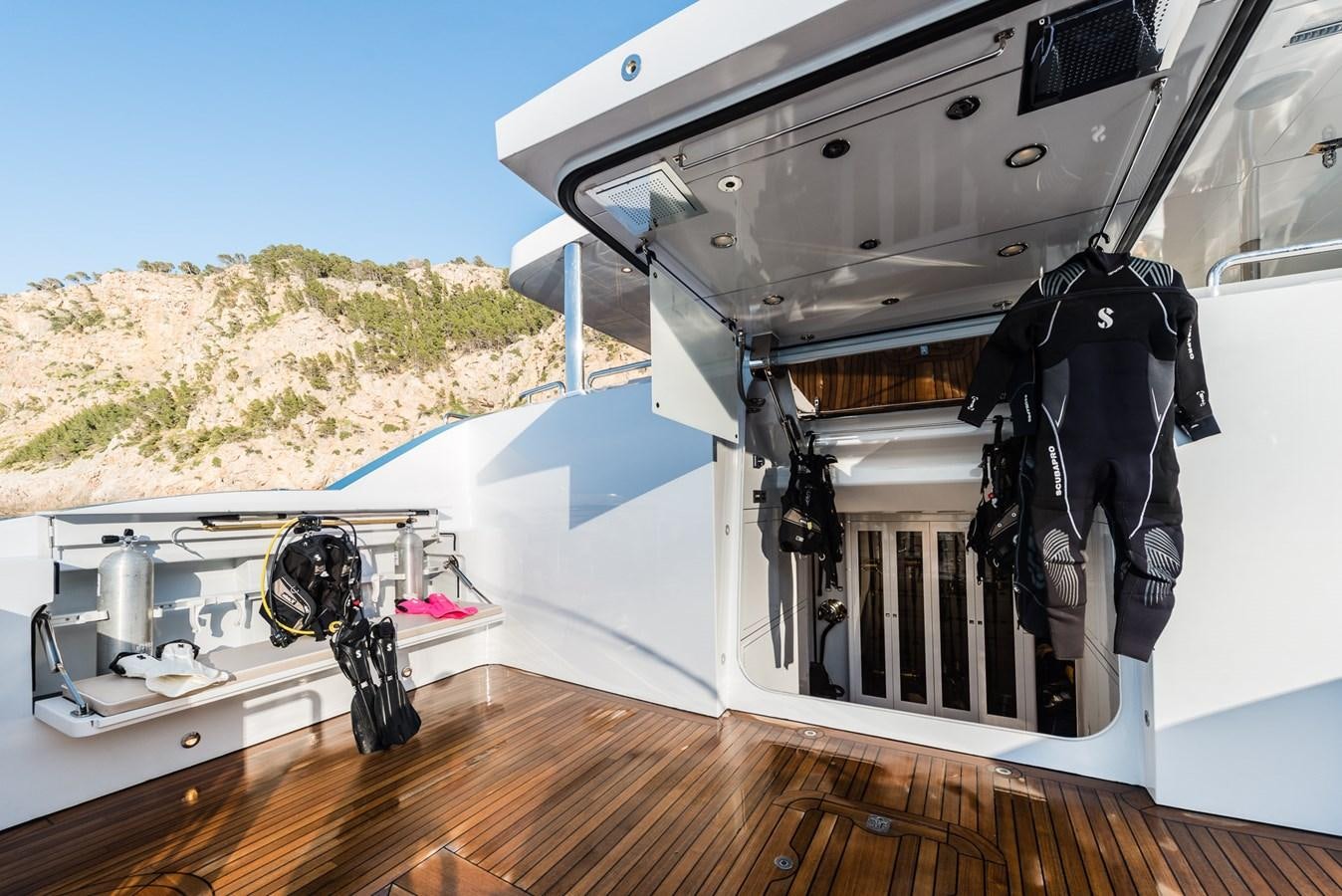 a pilot in a cockpit aboard FLYING MANTA Yacht for Sale