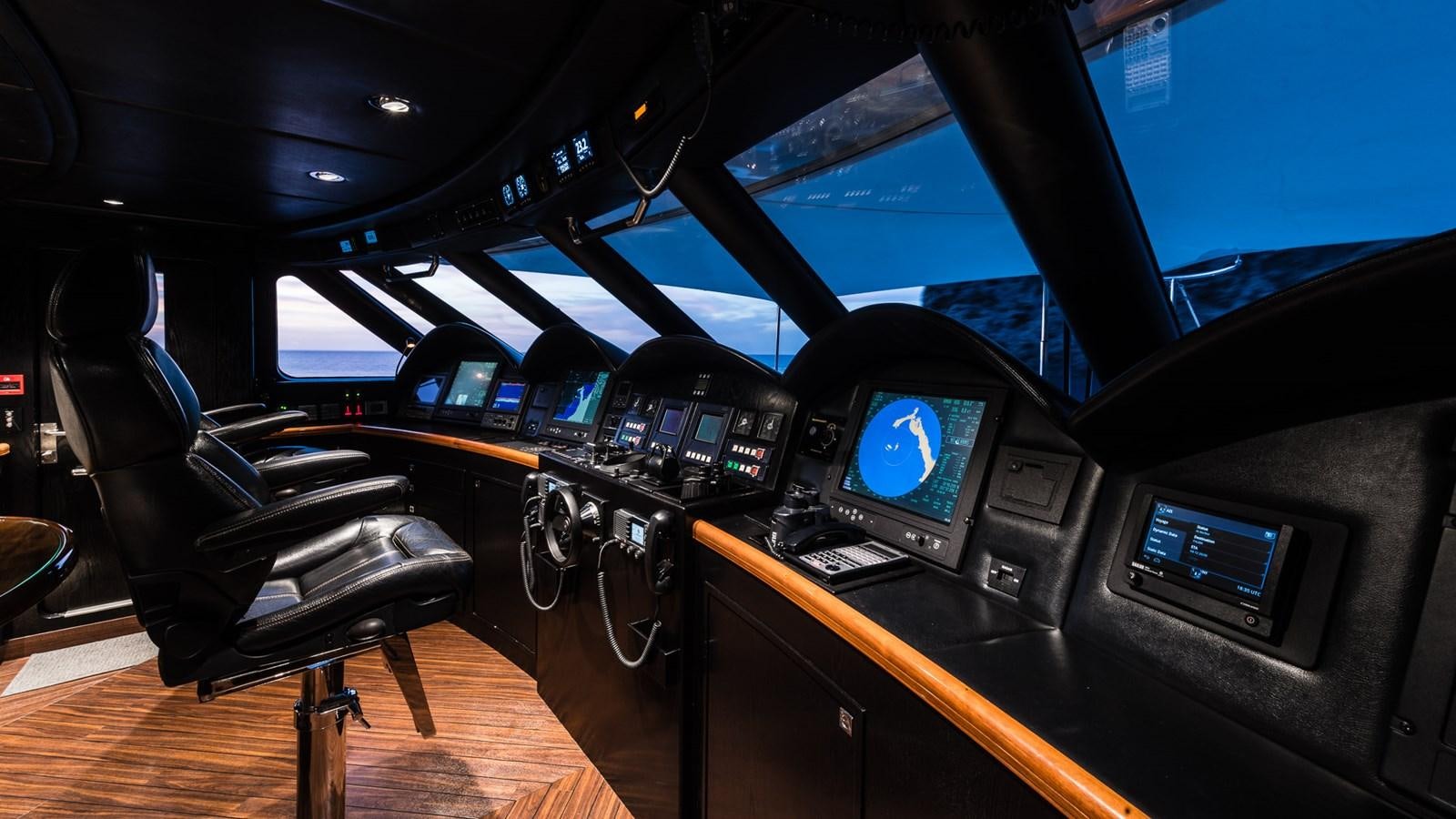 inside of a car aboard FLYING MANTA Yacht for Sale