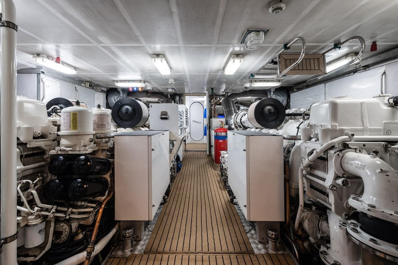 a room with large machinery aboard FLYING MANTA Yacht for Sale