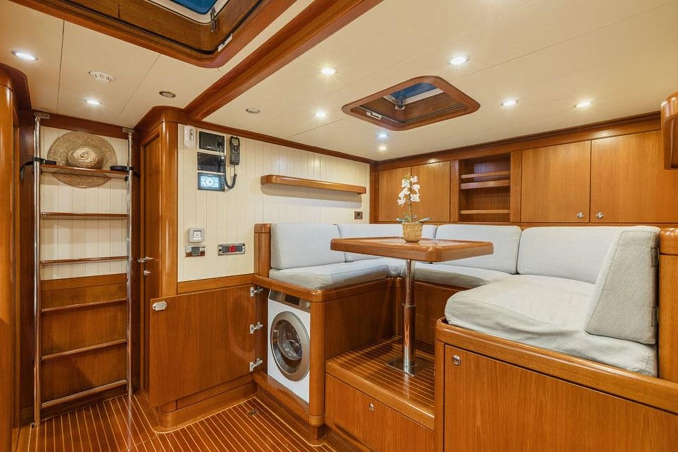 a room with a bed and a desk aboard PAULINE AF SKANOR Yacht for Sale