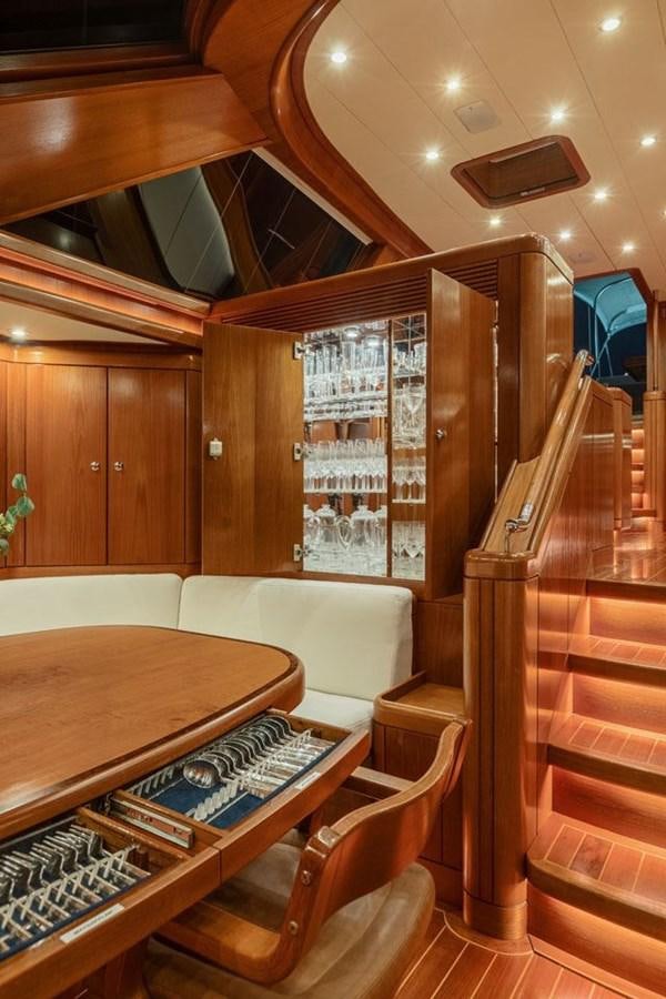 a bed and a couch in a room aboard PAULINE AF SKANOR Yacht for Sale
