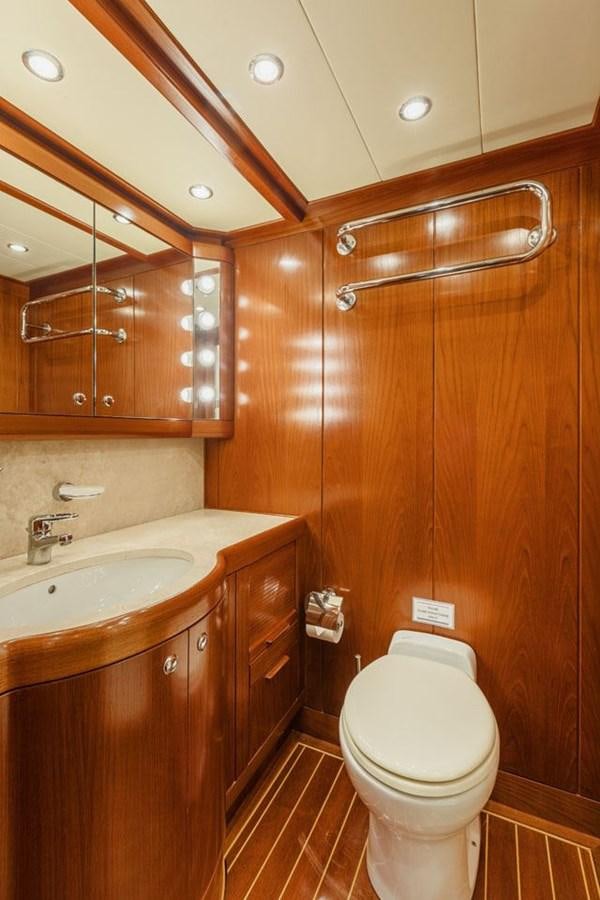 a bathroom with a toilet and a sink aboard PAULINE AF SKANOR Yacht for Sale