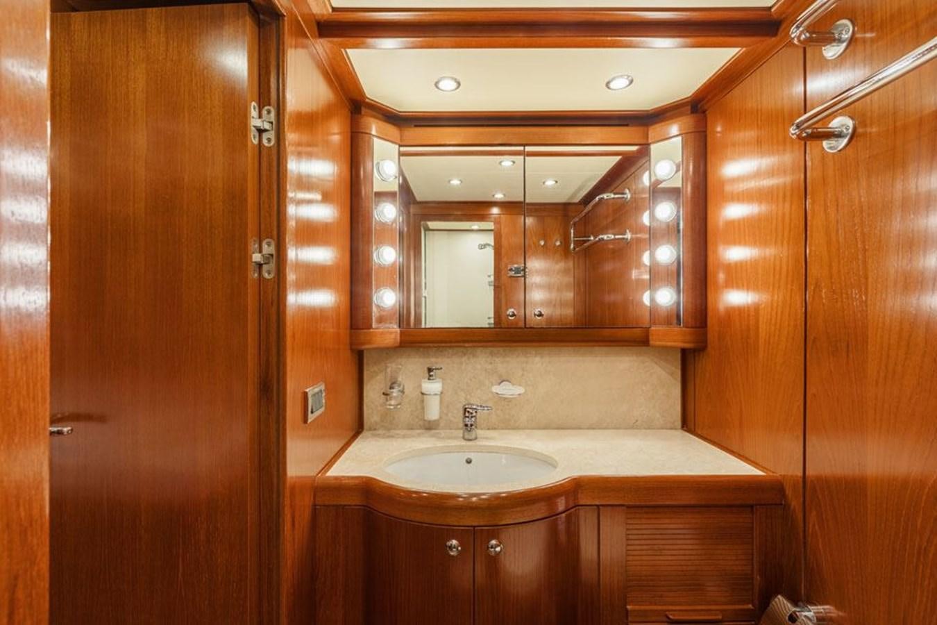 a bathroom with a sink and a mirror aboard PAULINE AF SKANOR Yacht for Sale