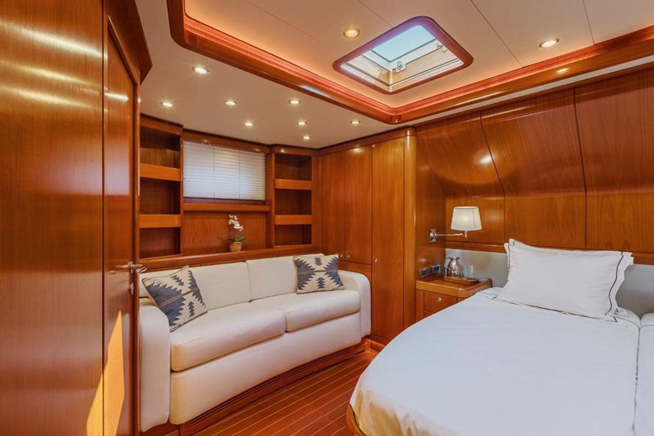 a room with a bed and a desk aboard PAULINE AF SKANOR Yacht for Sale