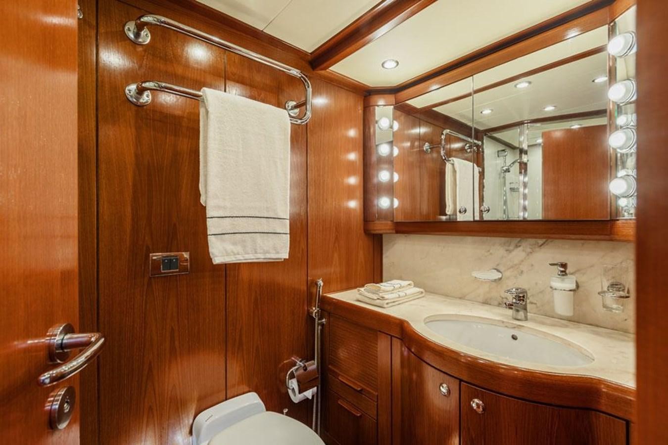 a bathroom with a sink and a mirror aboard PAULINE AF SKANOR Yacht for Sale