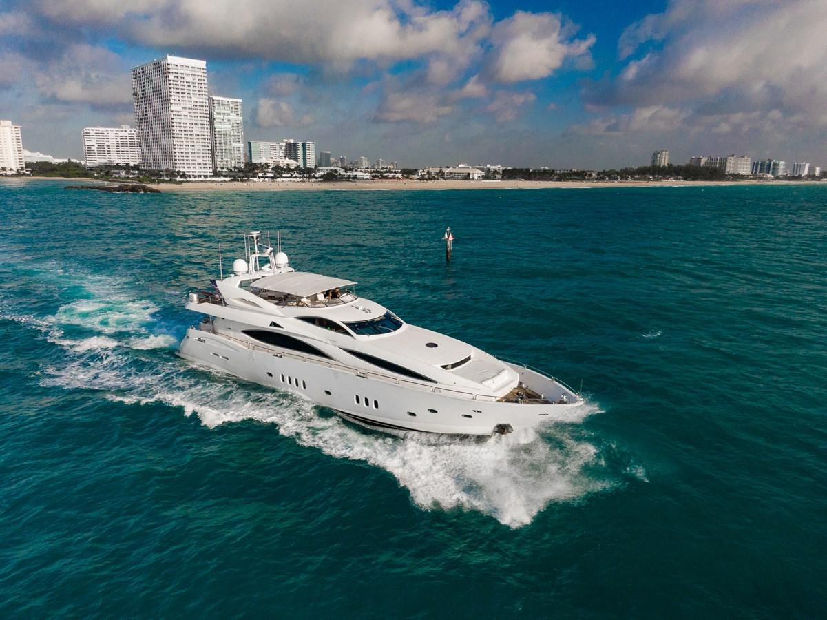 a white boat on the water aboard 105 MOTOR Yacht for Sale