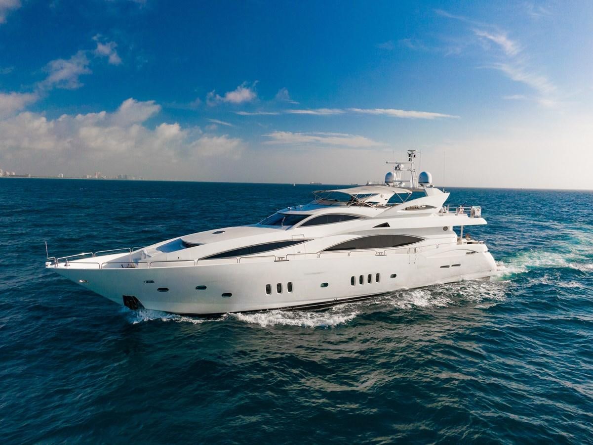 a white yacht in the ocean aboard 105 MOTOR Yacht for Sale