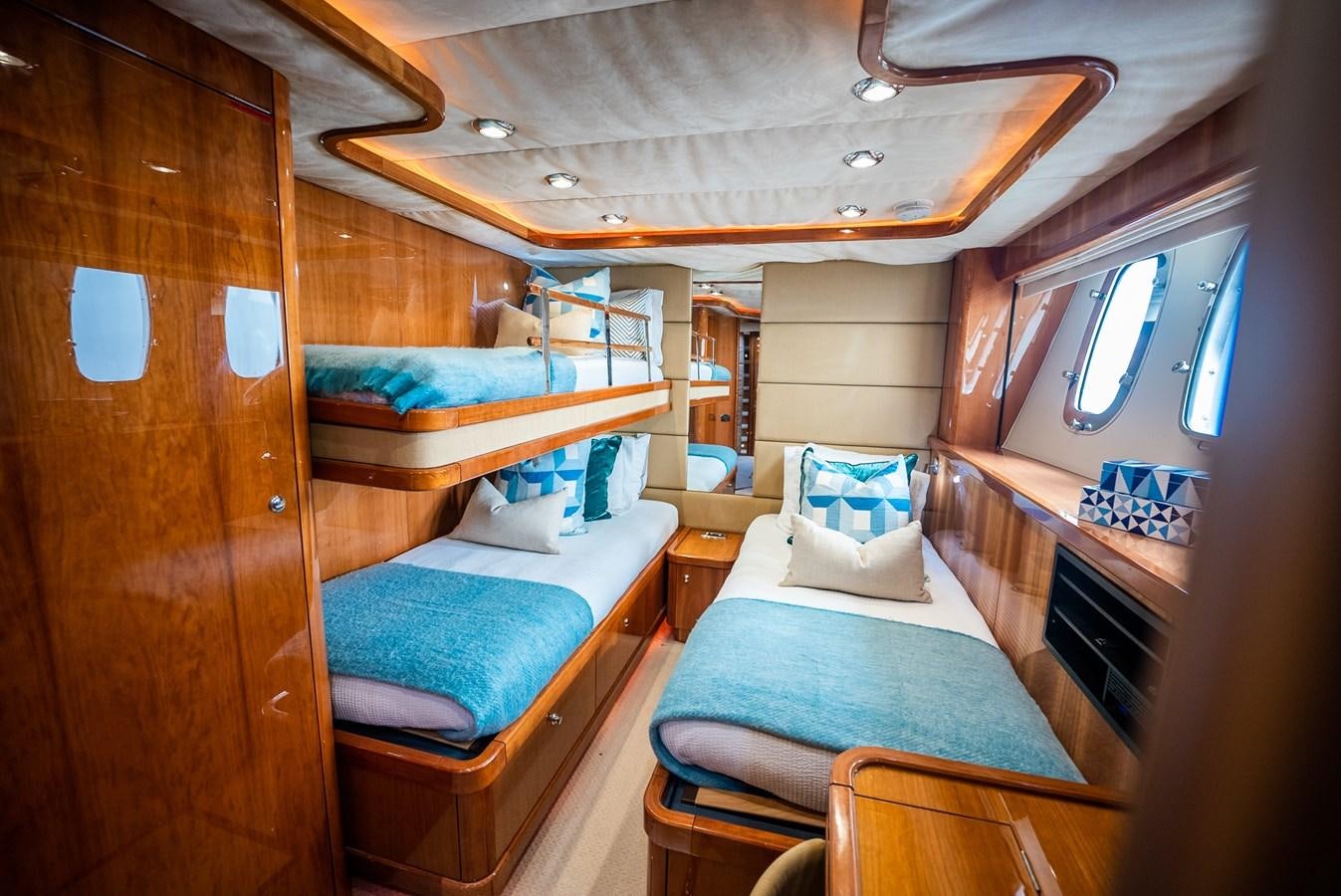 a cabin with bunk beds aboard 105 MOTOR Yacht for Sale