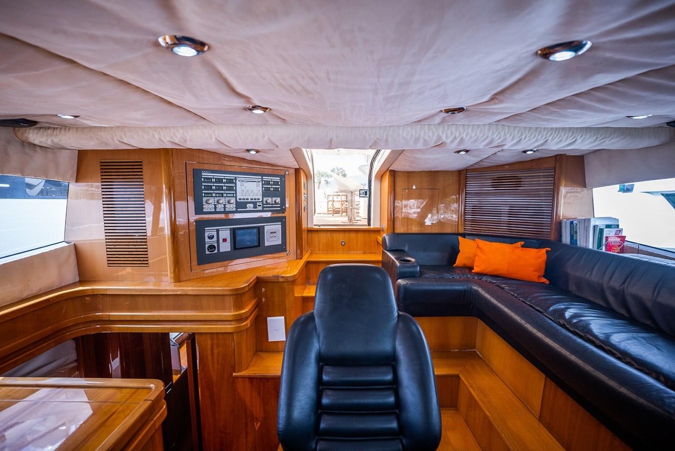 a room with a couch and a chair aboard 105 MOTOR Yacht for Sale