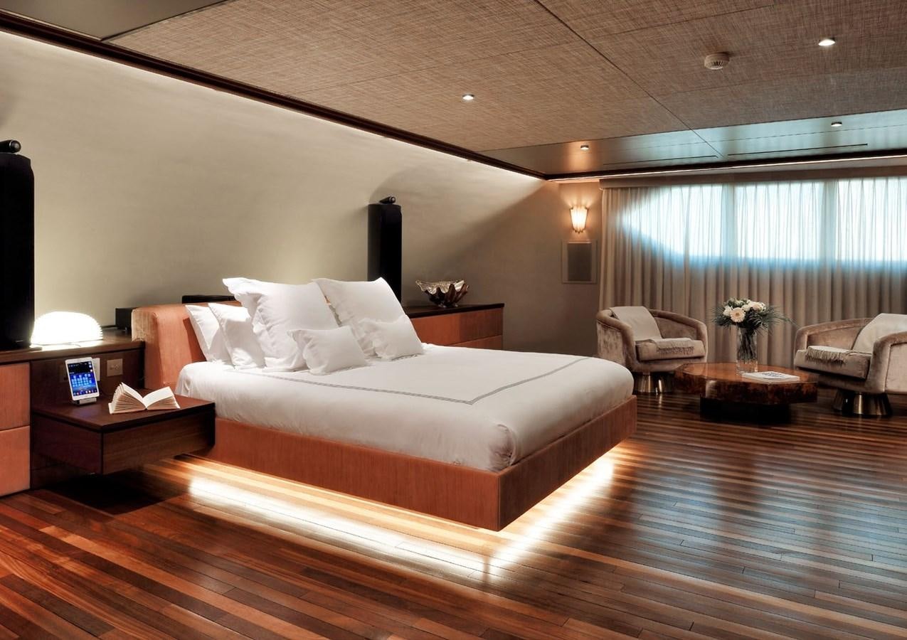 a large bed in a hotel room aboard SANOO Yacht for Sale