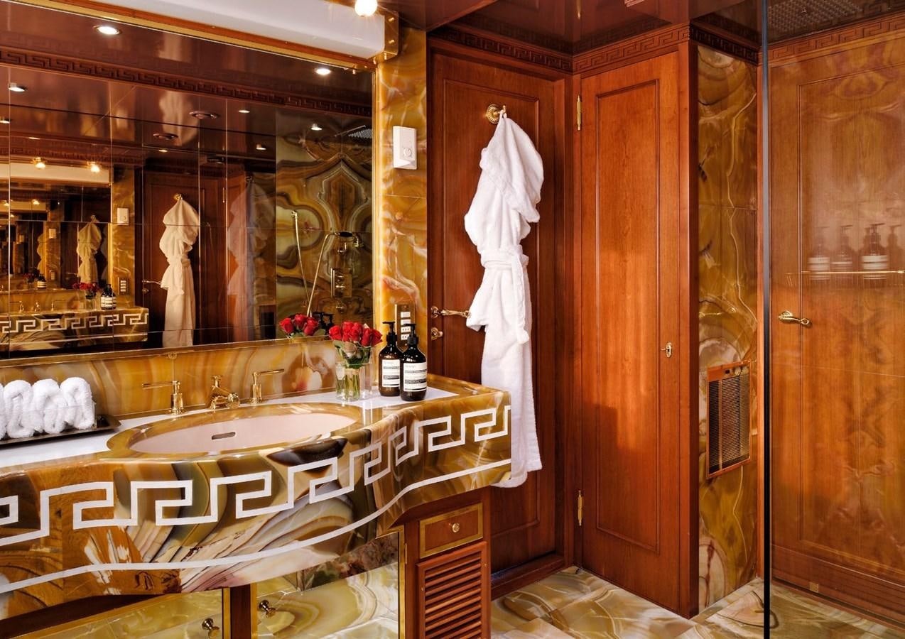 a fancy bathroom with a large mirror aboard SANOO Yacht for Sale