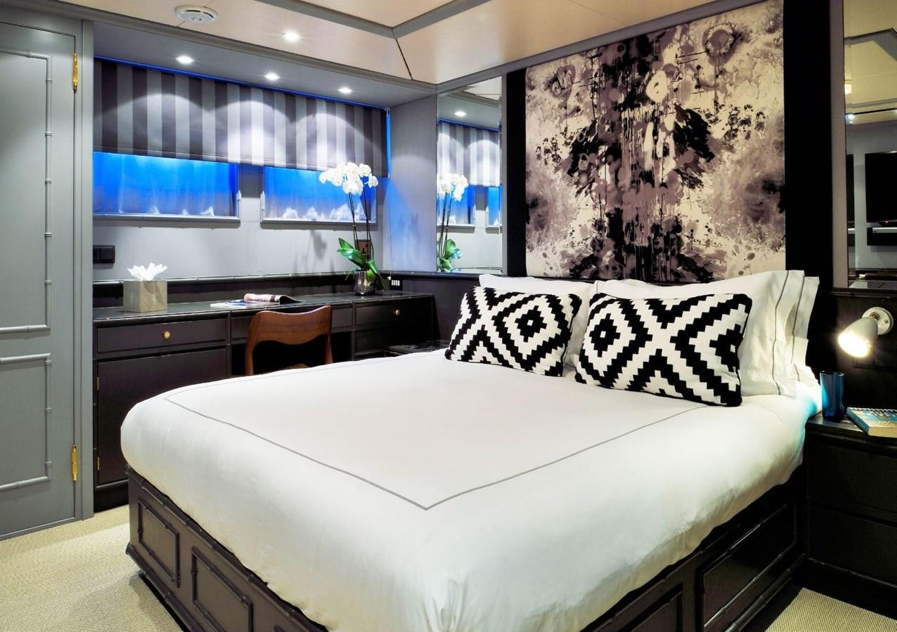 a bed in a room aboard SANOO Yacht for Sale