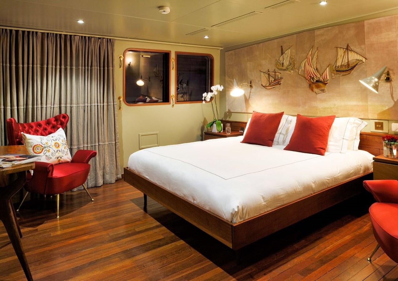 a bed in a hotel room aboard SANOO Yacht for Sale