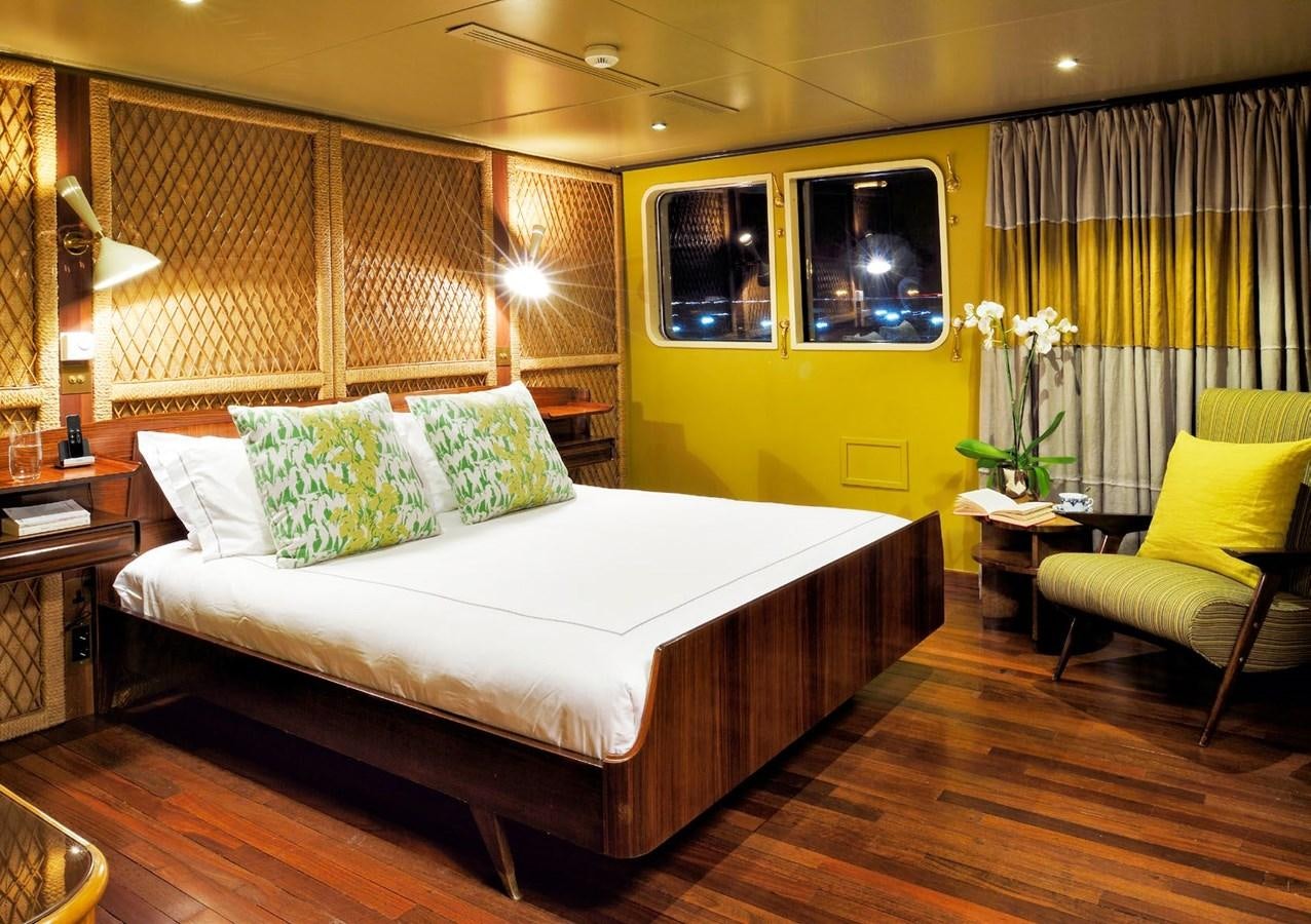 a bed in a room aboard SANOO Yacht for Sale