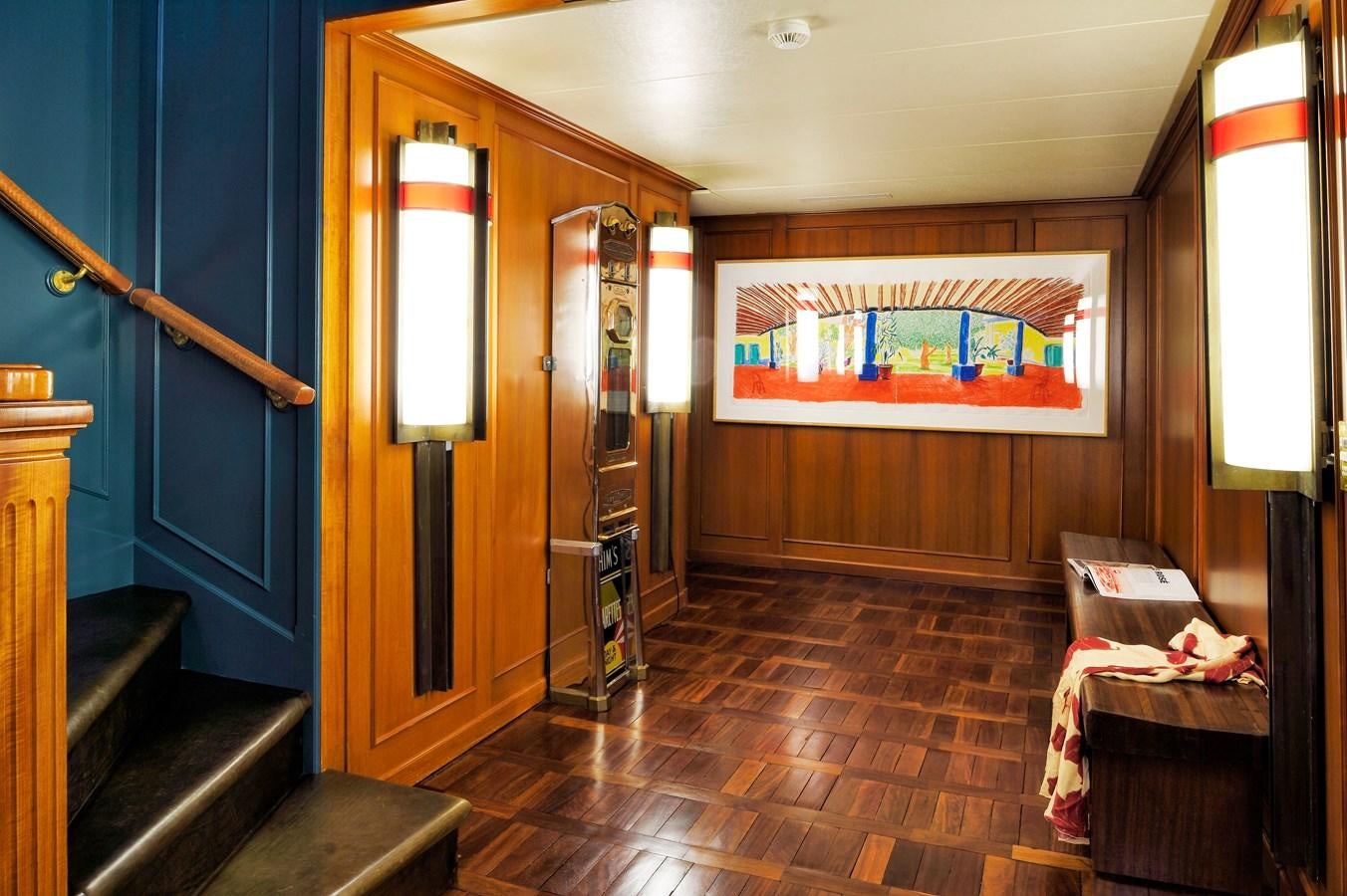 a room with a wood door and a mirror aboard SANOO Yacht for Sale
