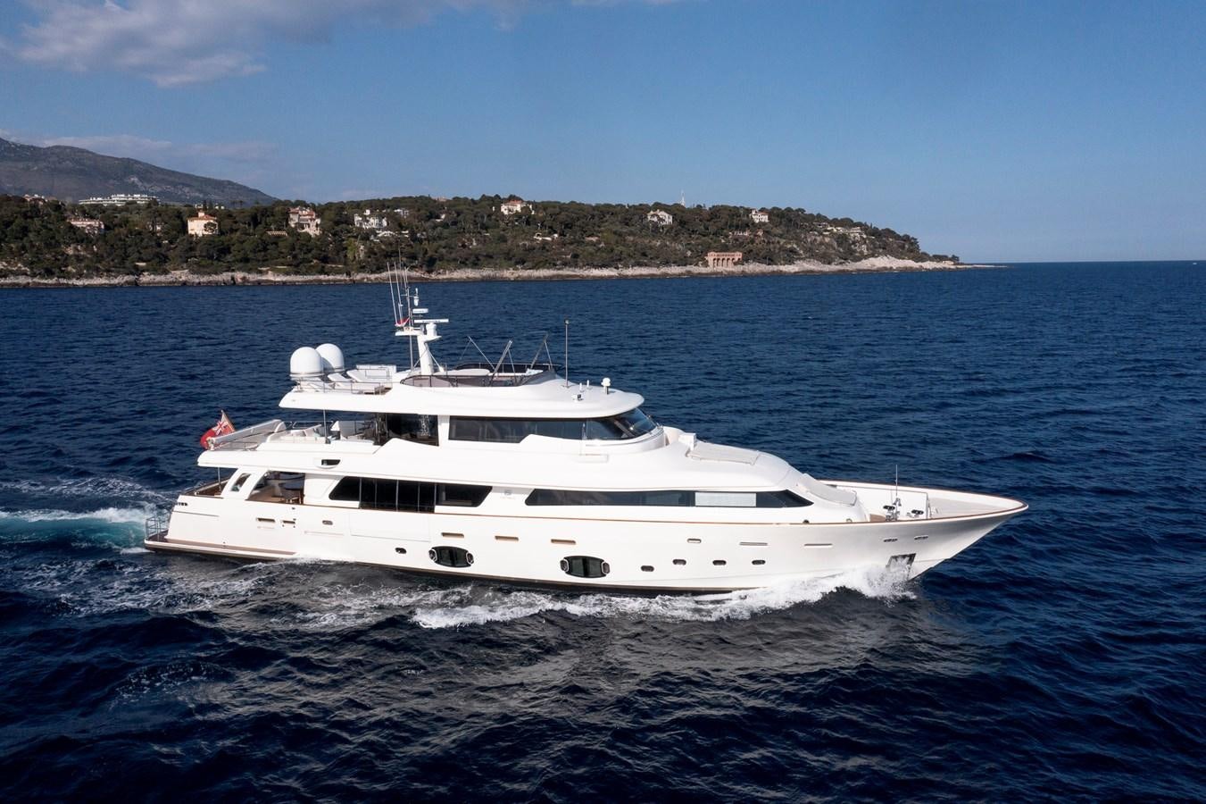 a white yacht on the water aboard CENTURION Yacht for Sale