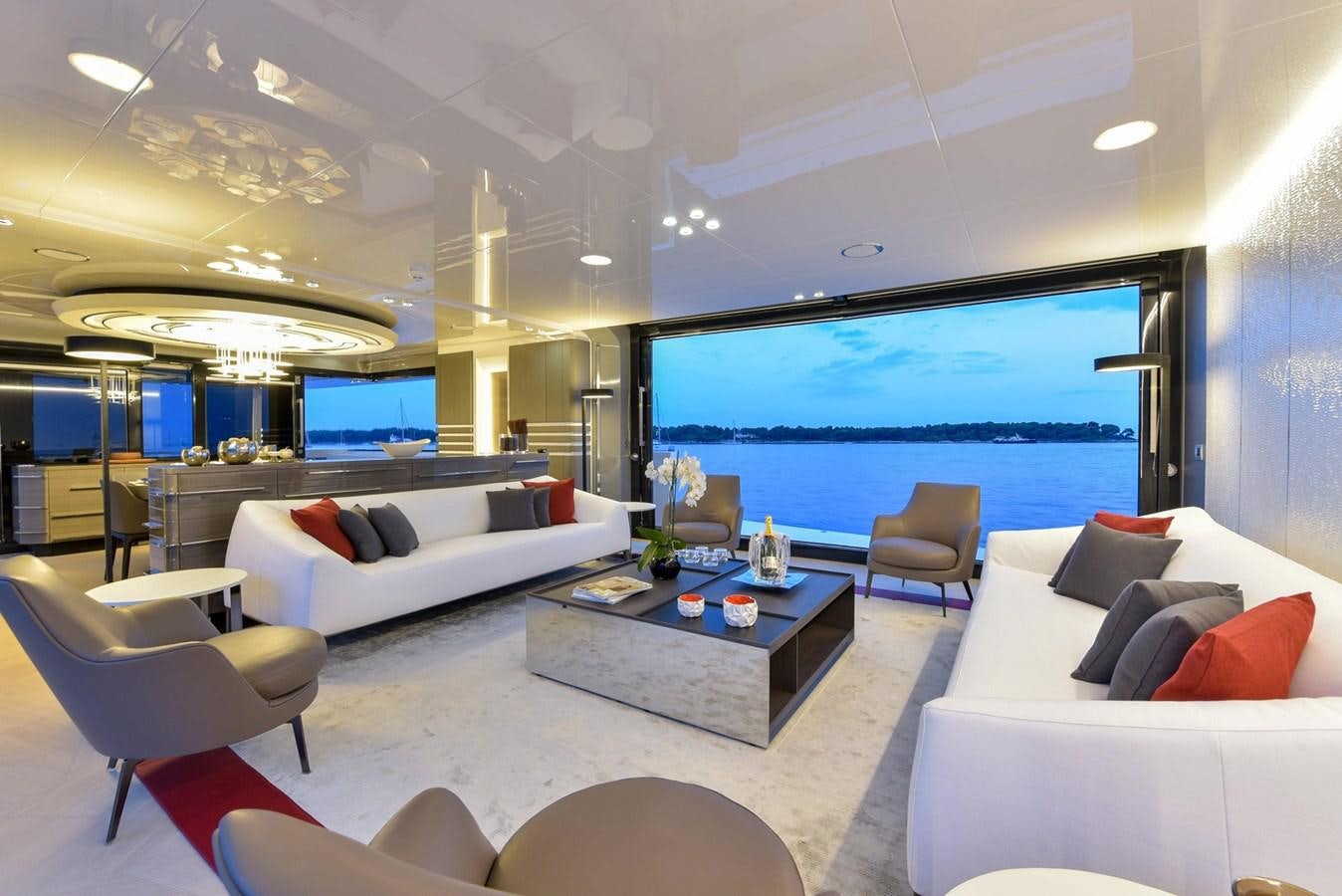 a living room with a large window aboard ARCADIA 100 Yacht for Sale