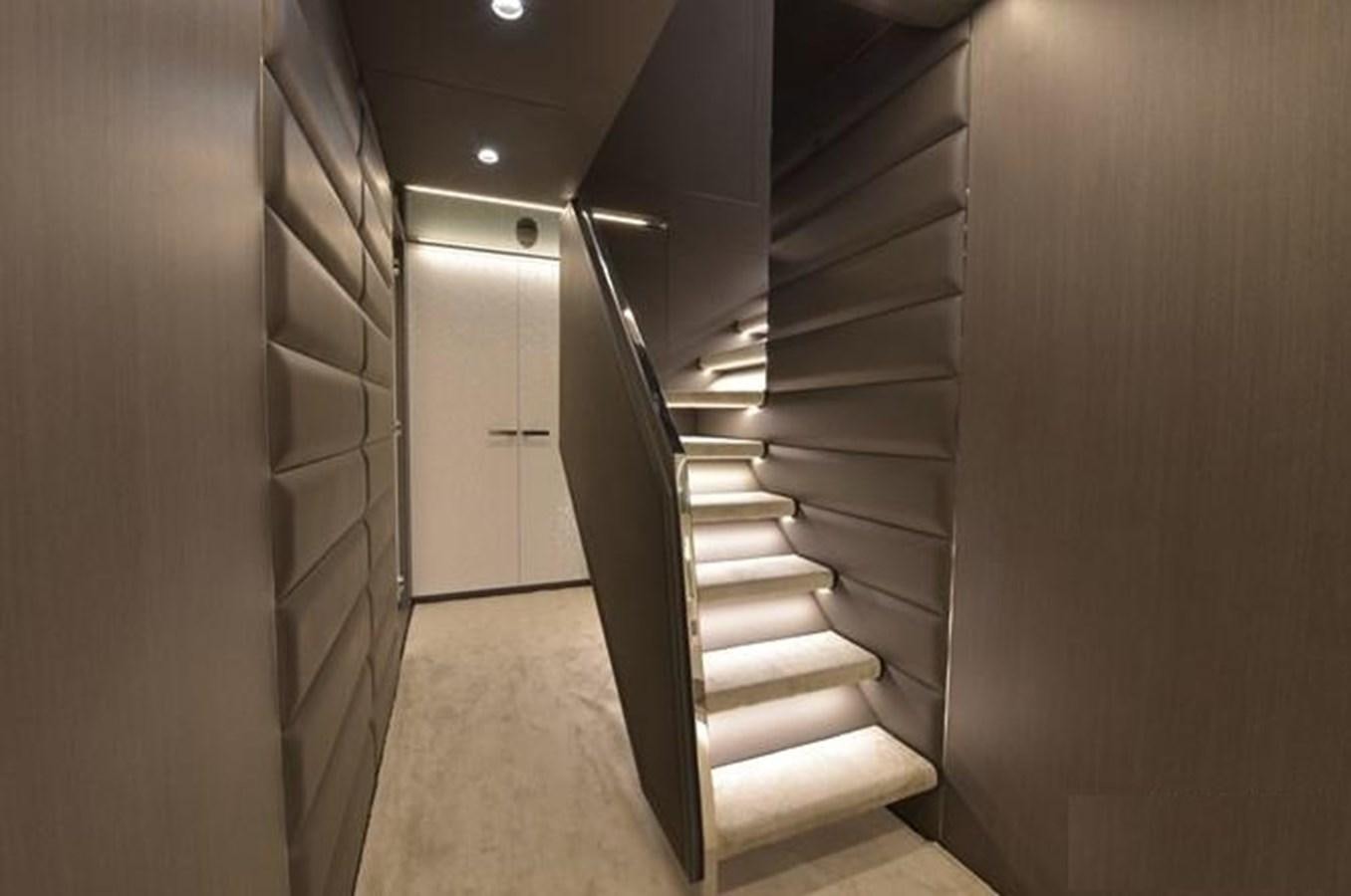 a hallway with white cabinets aboard ARCADIA 100 Yacht for Sale
