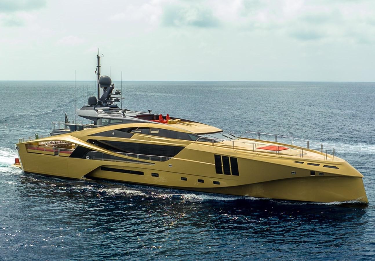 a yellow and white boat in the water aboard KHALILAH Yacht for Sale