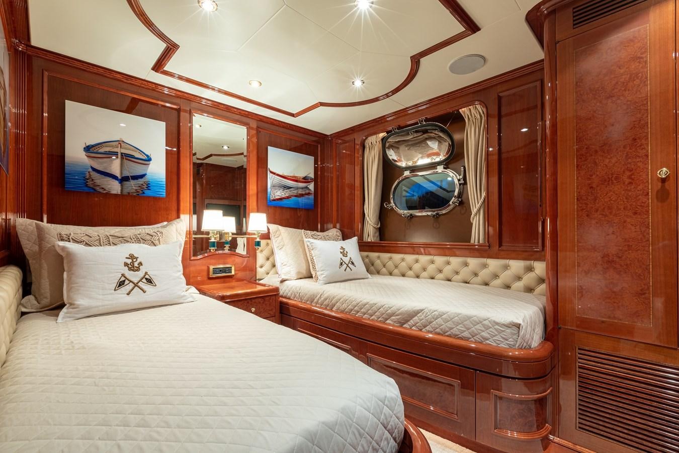 a hotel room with two beds aboard FELICITA Yacht for Sale