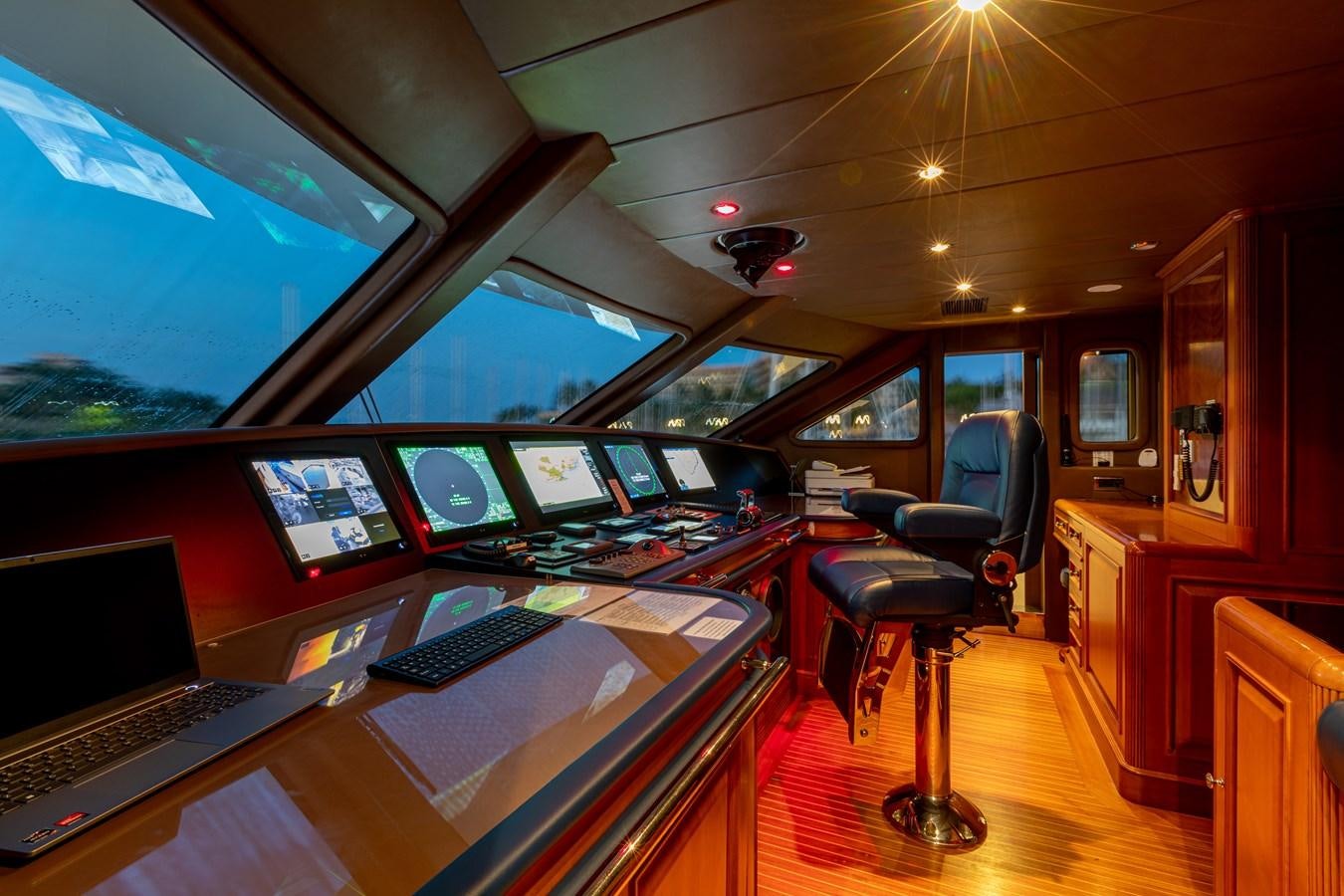 a room with computers and monitors aboard FELICITA Yacht for Sale